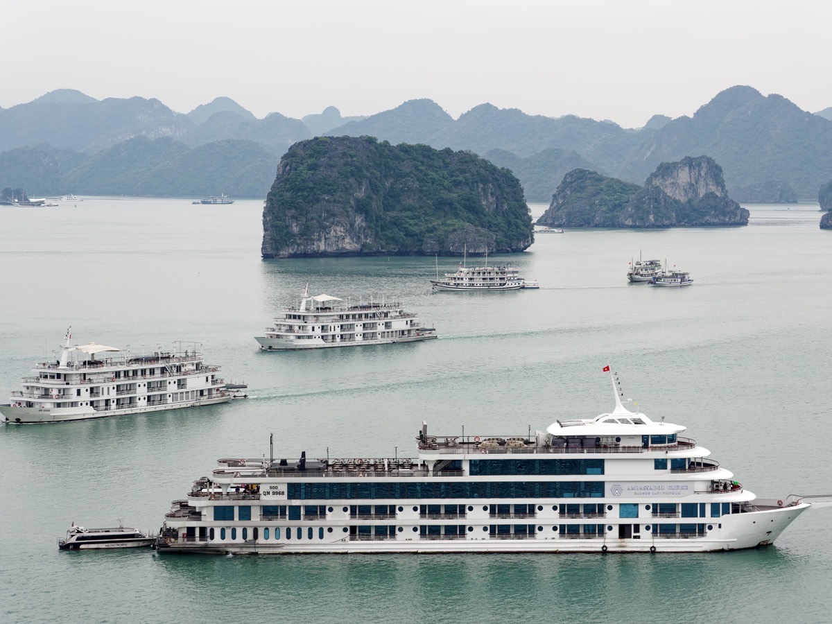 Cruise boats among the limestone islands of Ha Long Bay