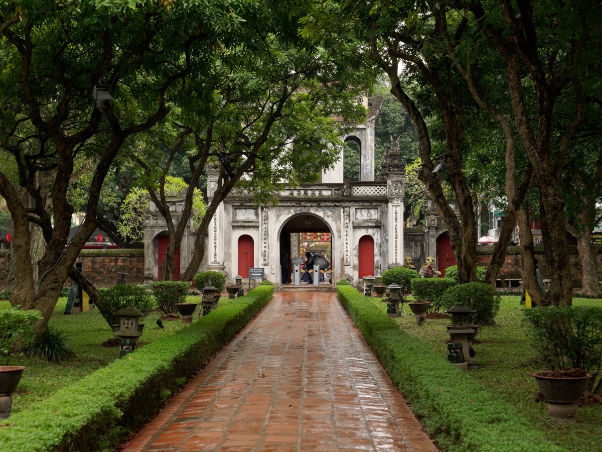 The tree-lined entrance path to the Temple of Literature in Hanoi