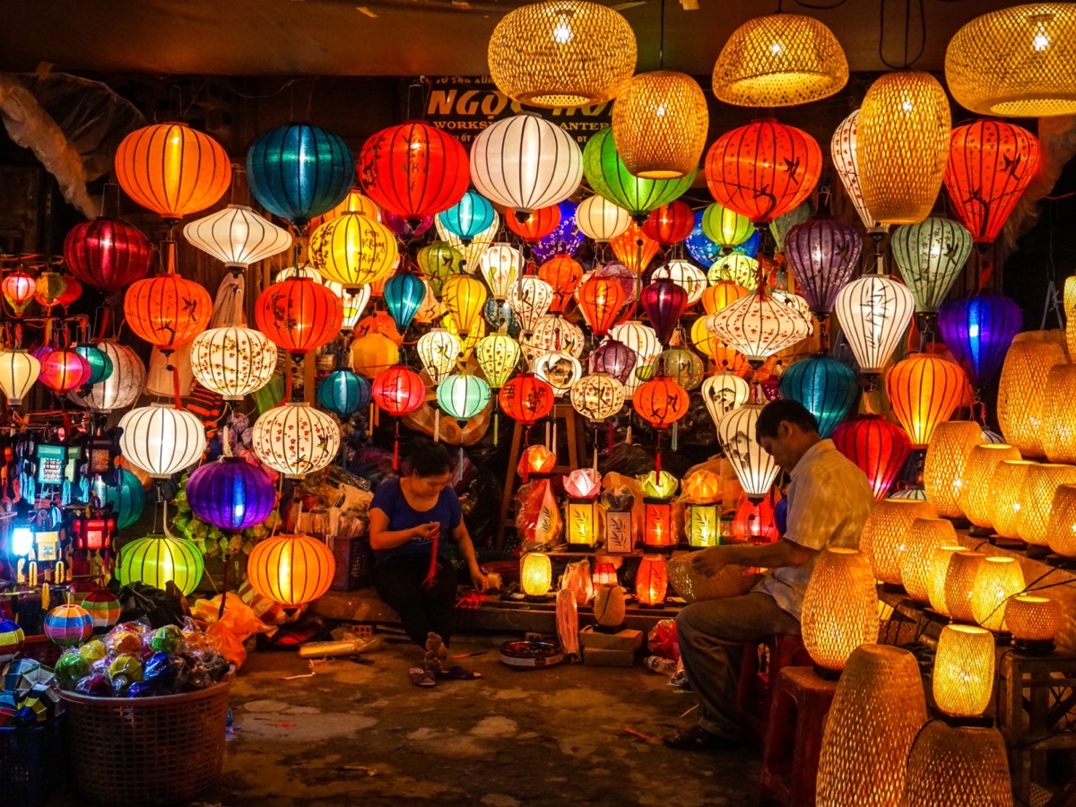 Colourful lanterns hanging in a Hoi An workshop